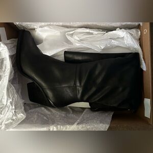 Zodiac black knee high boots, size 7M, never been worn.